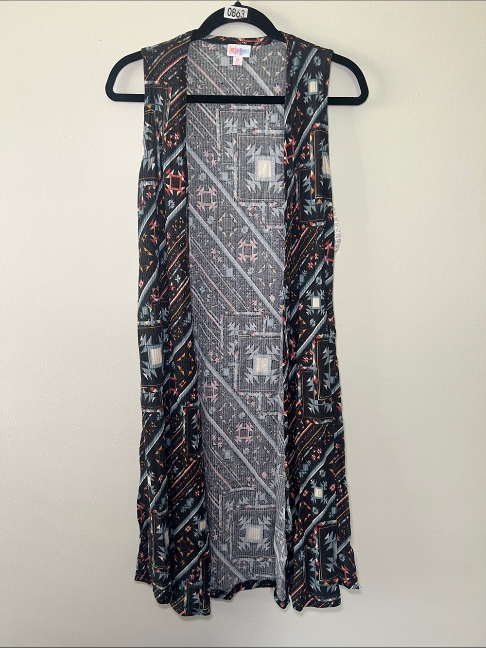 LuLaRoe Joy Black Cardigan Vest with Pink, Blue and Orange Geometric Print